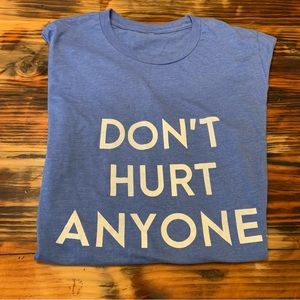 Don’t Hurt Anyone Blue shirt. Medium sized.